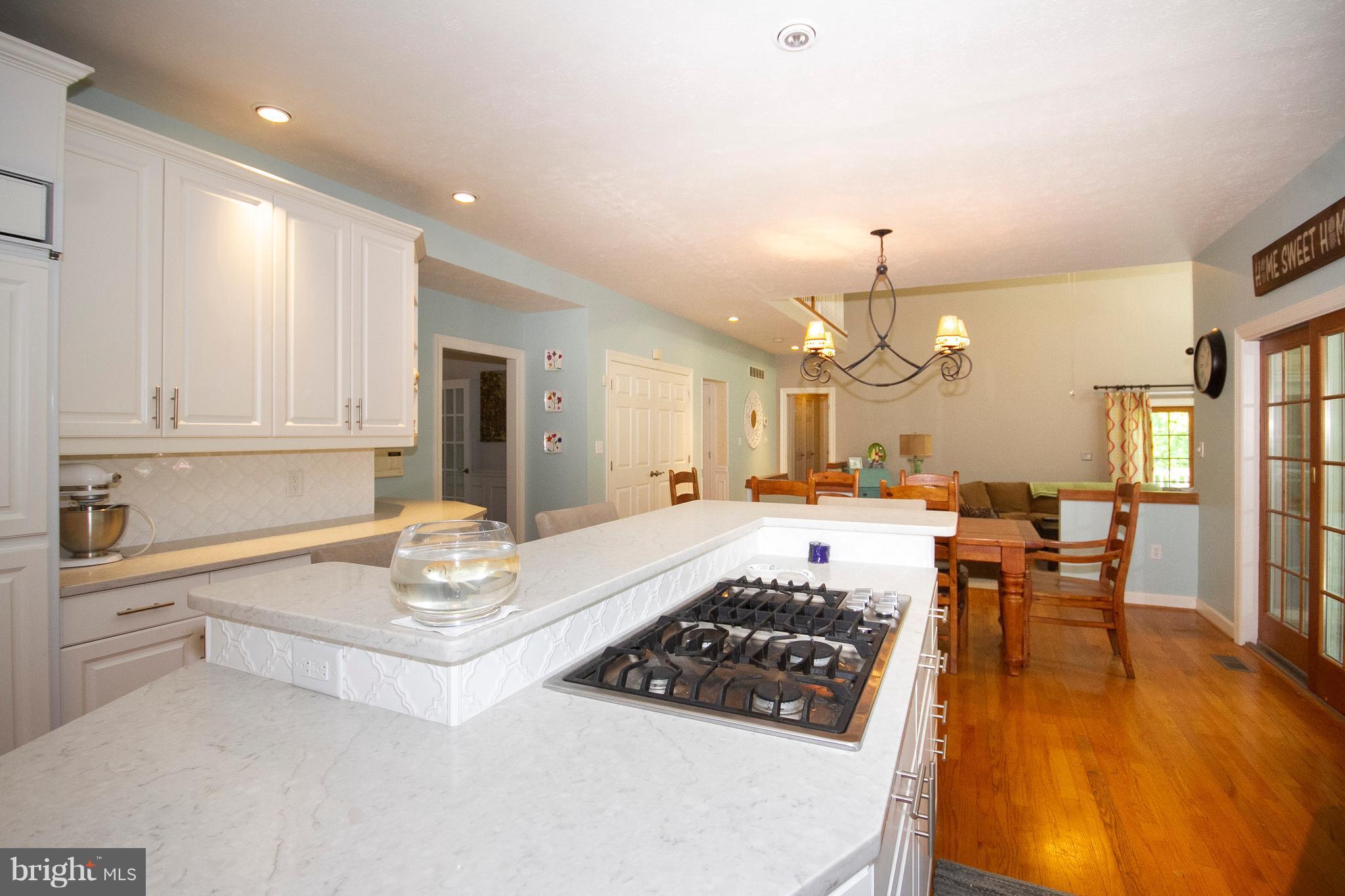 2818 Paper Mill Road Phoenix, MD 21131 - Photo 5 of 30 a kitchen with a table and chairs in it