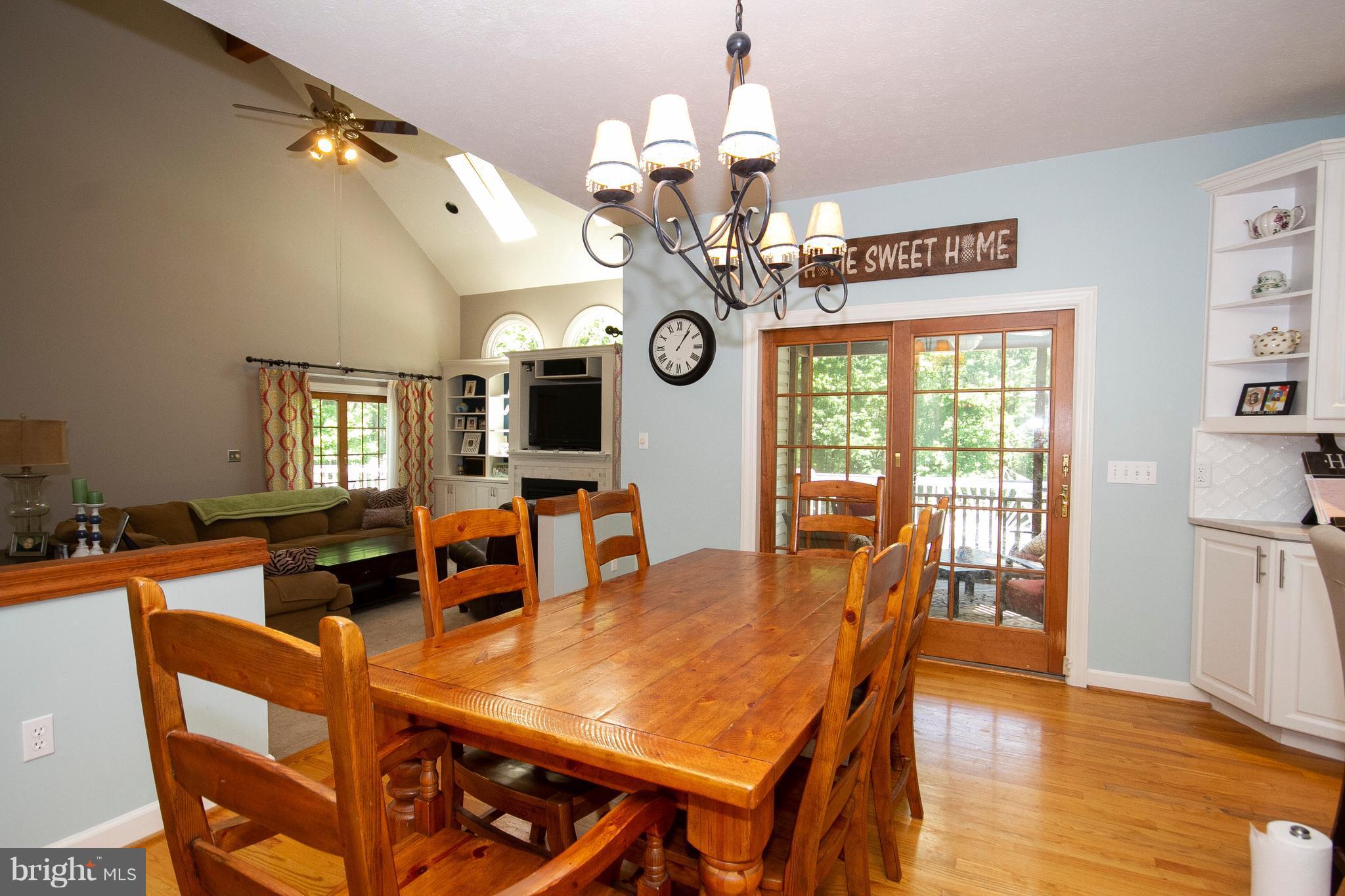 2818 Paper Mill Road Phoenix, MD 21131 - Photo 6 of 30 a view of a dining room with furniture window and wooden floor