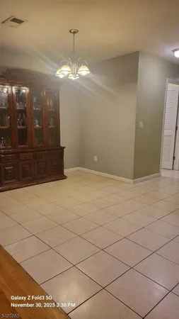 a view of a livingroom with a furniture