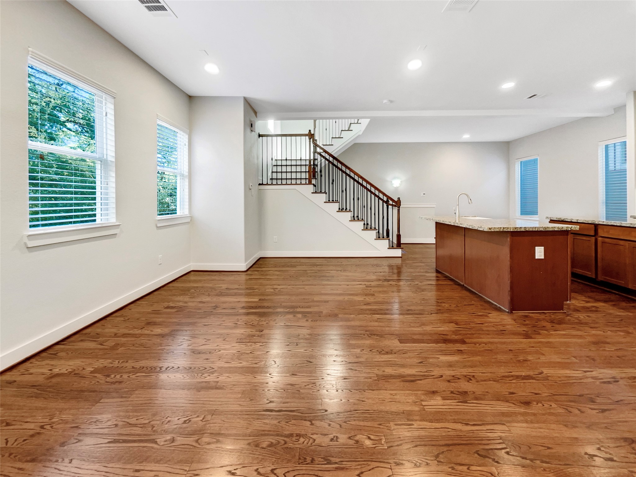 6625 Letein Street Houston, TX 77008 - Photo 16 of 17 a view of entryway and kitchen with wooden floor