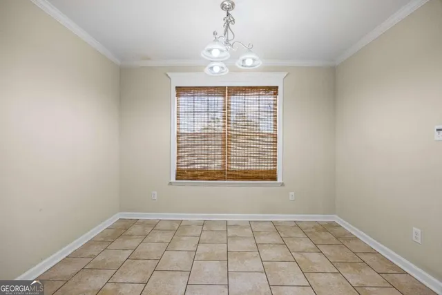 a view of an empty room with window