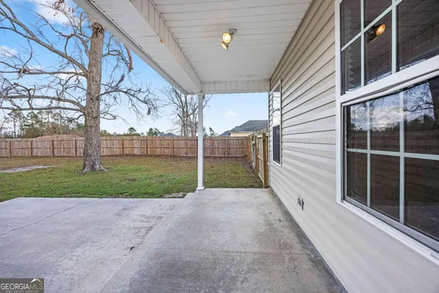 a view of a swimming pool in a yard