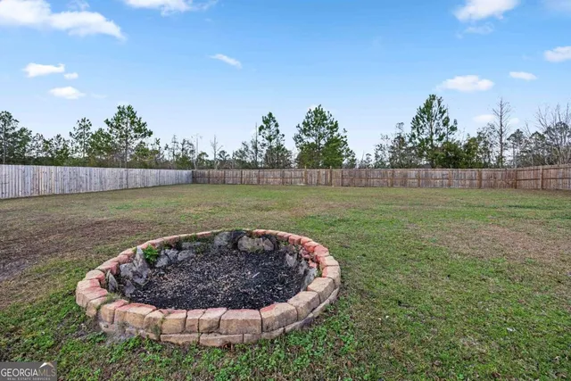 a house view with a garden space