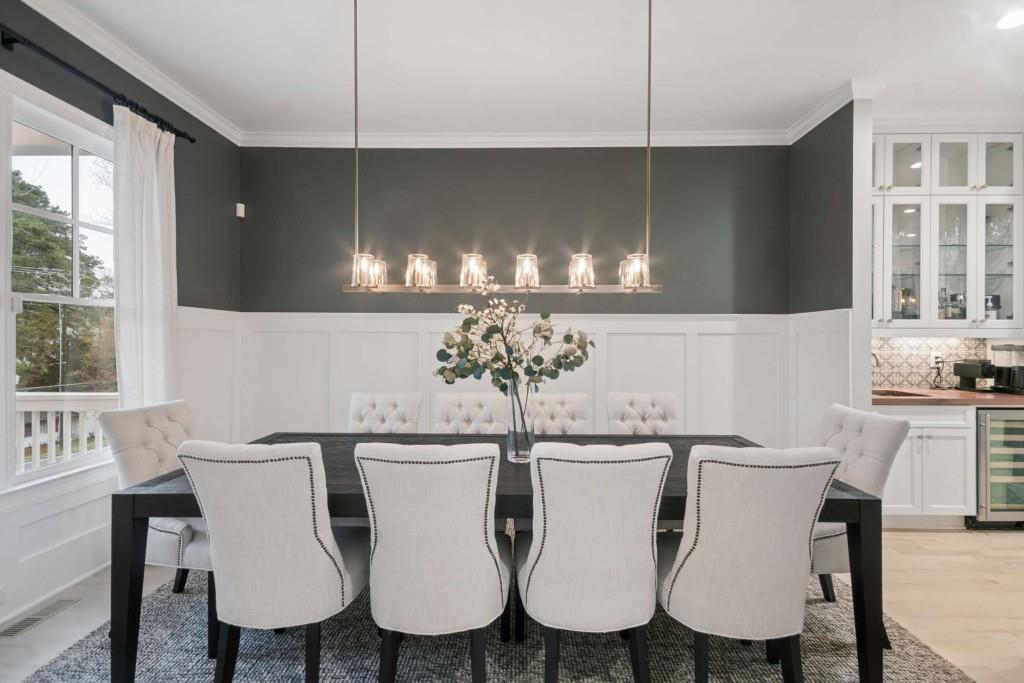 2561 Thompson Road Northeast Brookhaven, GA 30319 - Photo 11 of 47 a view of a dining room with furniture and chandelier