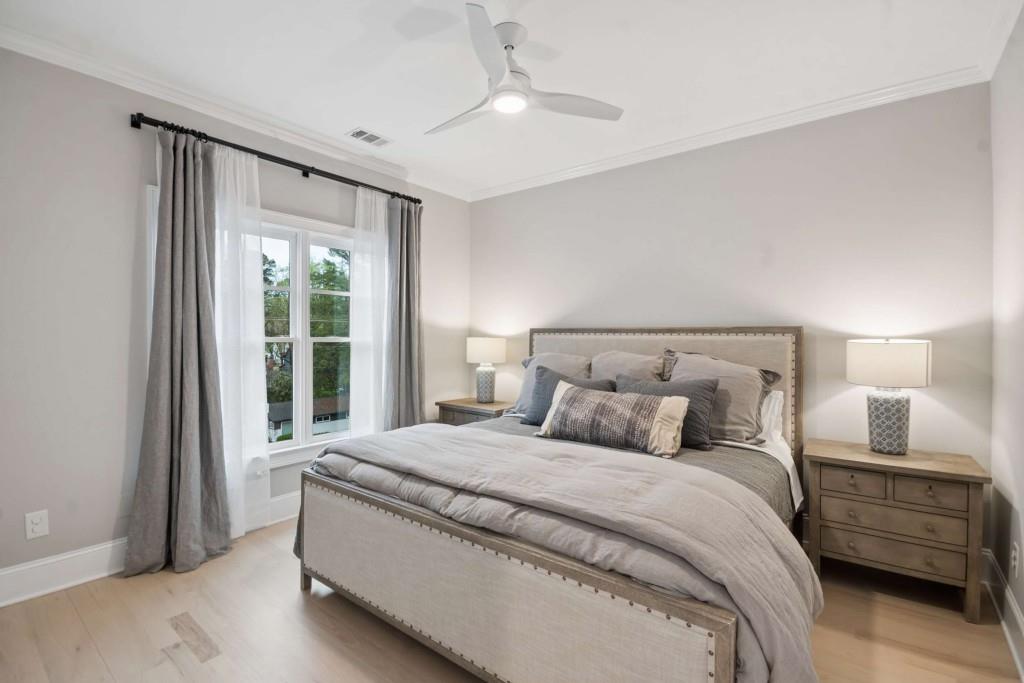 2561 Thompson Road Northeast Brookhaven, GA 30319 - Photo 23 of 47 a bedroom with a large bed and a window