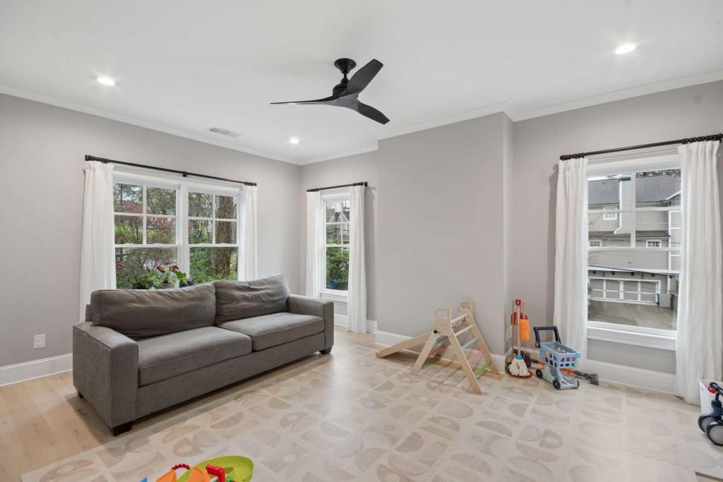 2561 Thompson Road Northeast Brookhaven, GA 30319 - Photo 29 of 47 a living room with furniture and a window
