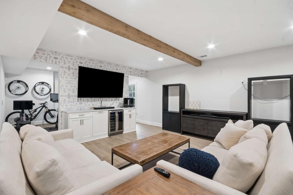 2561 Thompson Road Northeast Brookhaven, GA 30319 - Photo 32 of 47 a living room with furniture and a flat screen tv