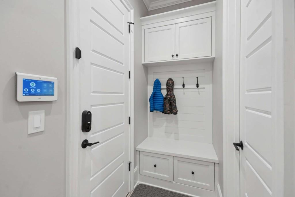 2561 Thompson Road Northeast Brookhaven, GA 30319 - Photo 39 of 47 a view of walk in closet with white cabinet