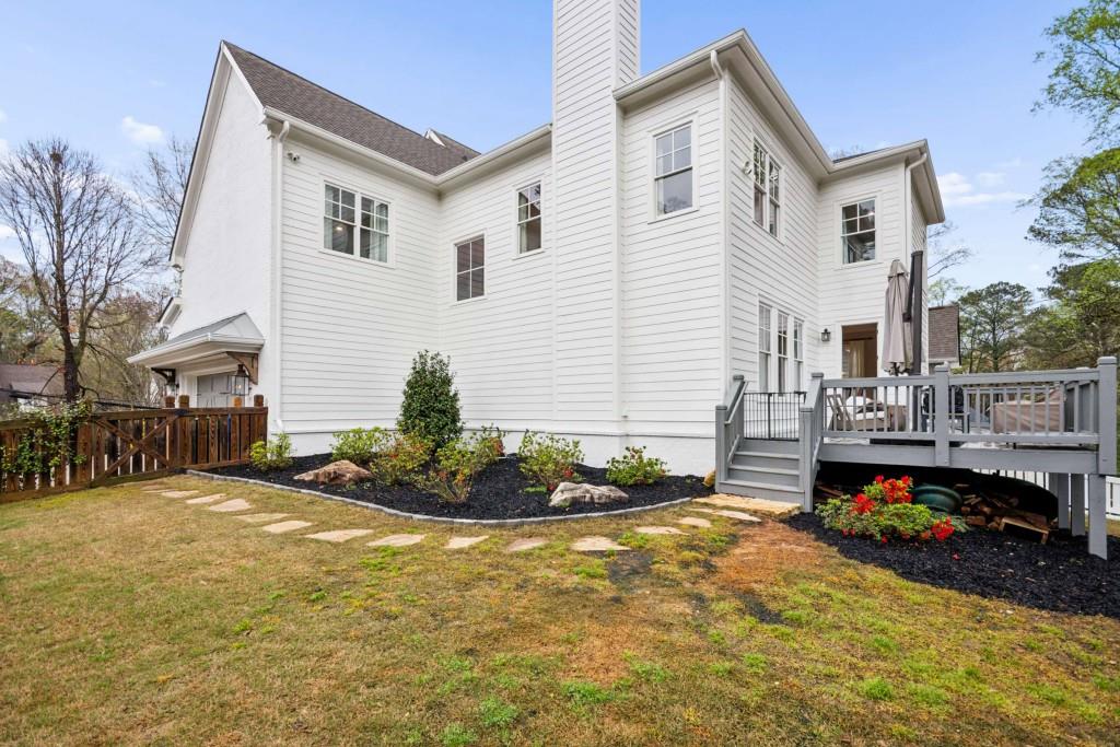 2561 Thompson Road Northeast Brookhaven, GA 30319 - Photo 40 of 47 a front view of a house with a yard