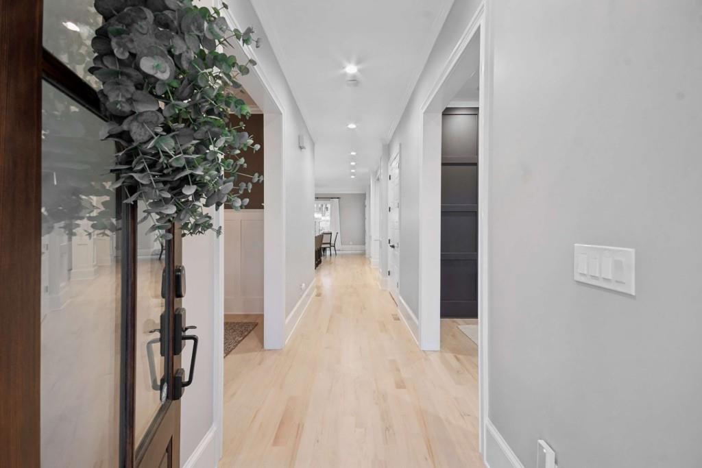 2561 Thompson Road Northeast Brookhaven, GA 30319 - Photo 4 of 47 a view of a hallway with wooden floor and entryway
