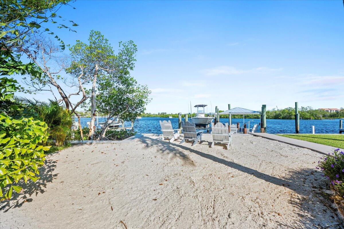 119 Elsa Road Jupiter, FL 33477 - Photo 10 of 37 Backyard Sandy Beach