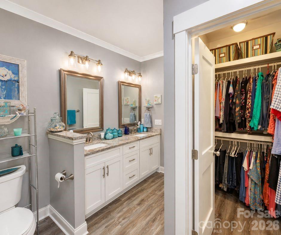 699 Sellerstown Road Cherryville, NC 28021 - Photo 16 of 22 a spacious bathroom with a double vanity sink and a mirror