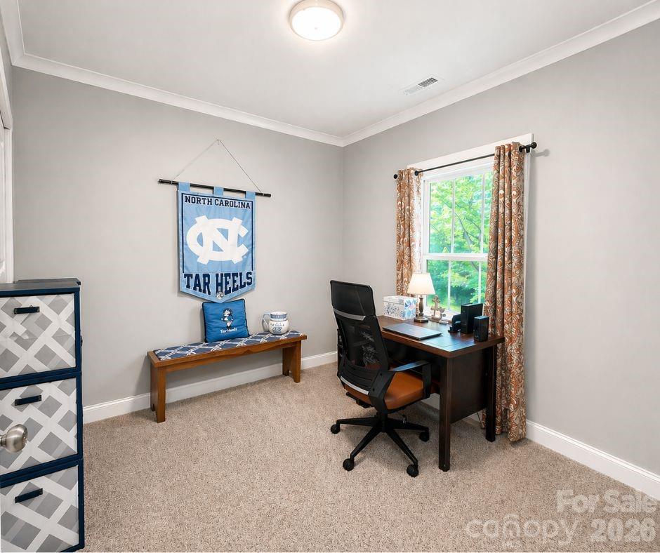 699 Sellerstown Road Cherryville, NC 28021 - Photo 19 of 22 a view of a workspace with furniture and a window