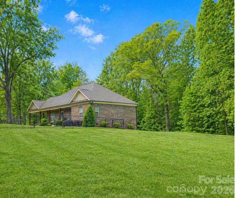 699 Sellerstown Road Cherryville, NC 28021 - Photo 2 of 22 a view of a house with a yard