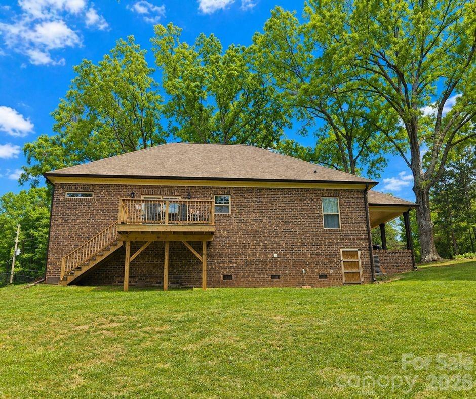 699 Sellerstown Road Cherryville, NC 28021 - Photo 3 of 22 a front view of a house with a garden