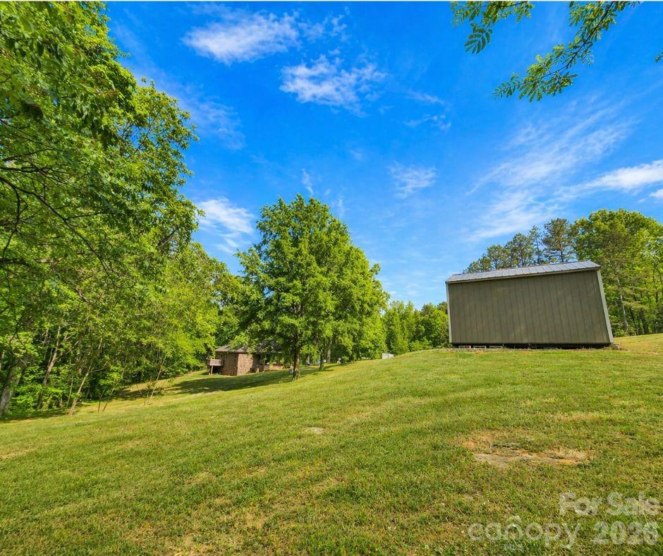 699 Sellerstown Road Cherryville, NC 28021 - Photo 6 of 22 a view of a yard with a house