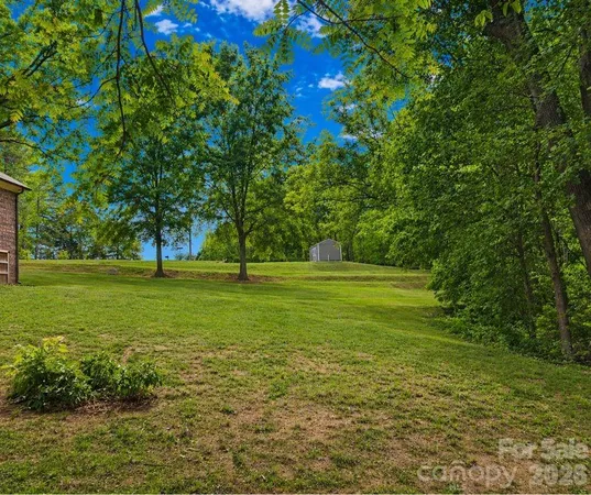 a view of field with trees