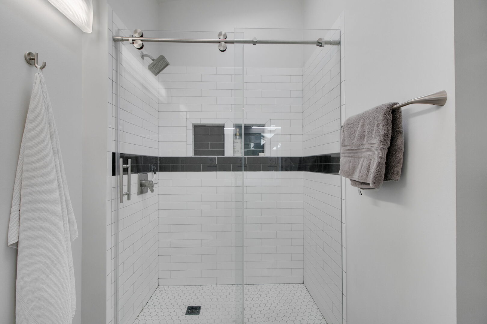 241 East Burlington Street, Unit C Riverside, IL 60546 - Photo 15 of 27 a bathroom with a shower