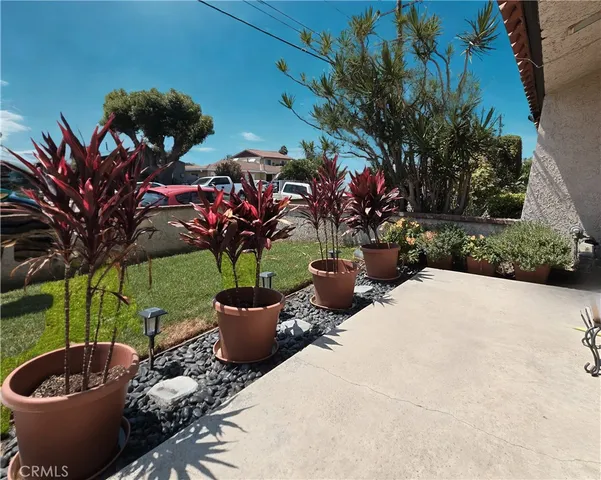 a living room with a flat screen tv and a fireplace
