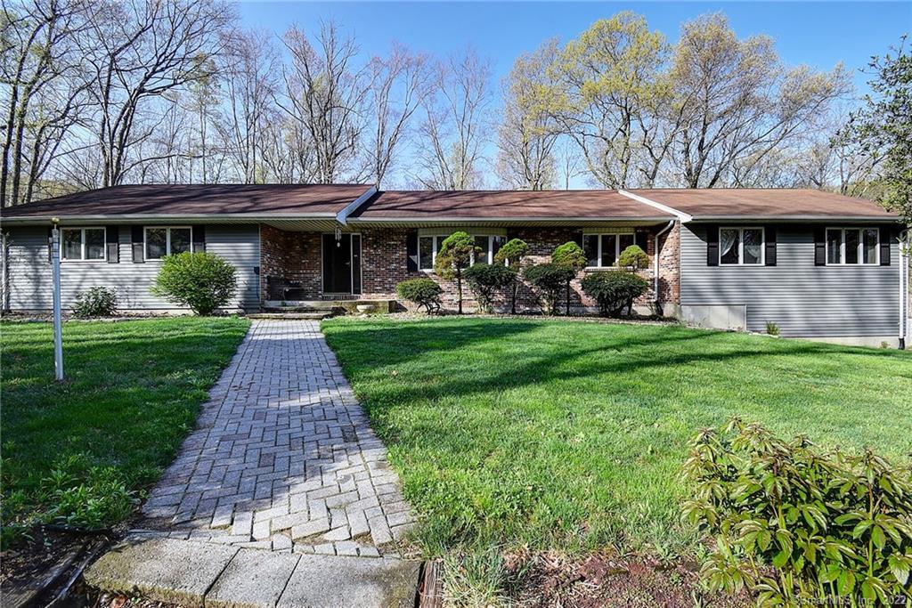 810 Neipsic Road Glastonbury, CT 06033 - Photo 1 of 1 a front view of a house with a yard
