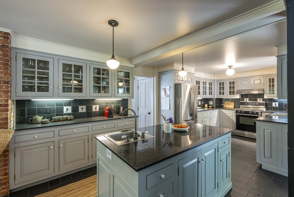 2 Chestnut Hill Road Leverett, MA 01054 - Photo 1 of 42 a kitchen with stainless steel appliances granite countertop a sink a stove and a wooden floors