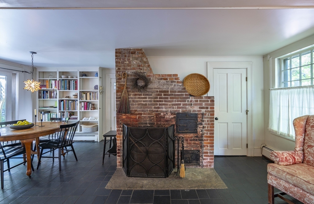 2 Chestnut Hill Road Leverett, MA 01054 - Photo 11 of 42 a living room with furniture a rug and a fireplace
