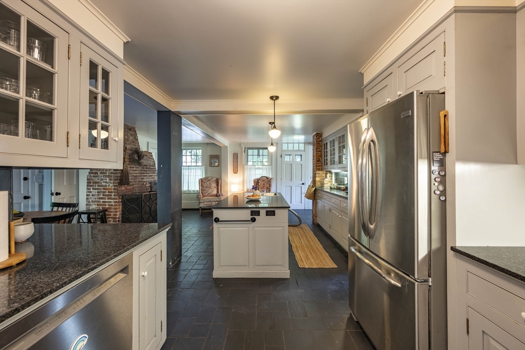 2 Chestnut Hill Road Leverett, MA 01054 - Photo 14 of 42 a kitchen with stainless steel appliances granite countertop a refrigerator a stove and a sink with cabinets