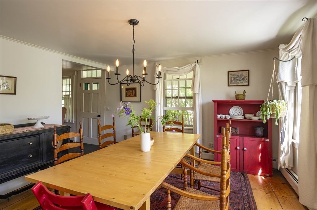 2 Chestnut Hill Road Leverett, MA 01054 - Photo 15 of 42 a room with furniture a rug and a chandelier