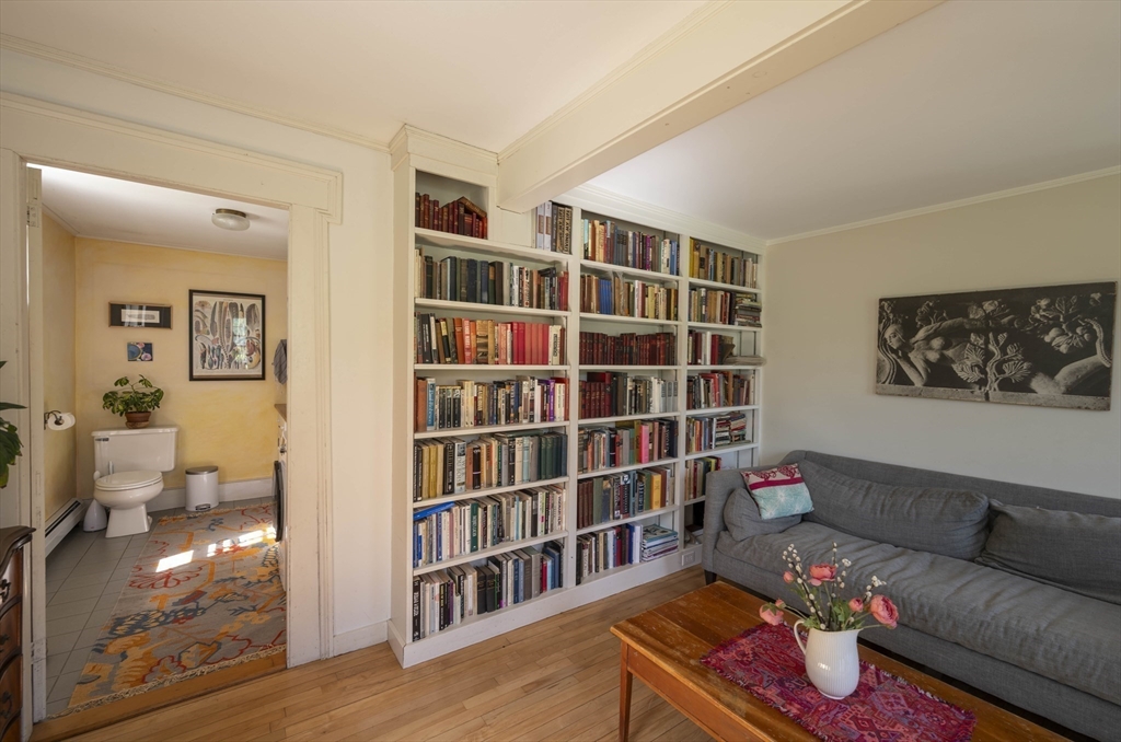 2 Chestnut Hill Road Leverett, MA 01054 - Photo 18 of 42 a living room with furniture and a book shelf