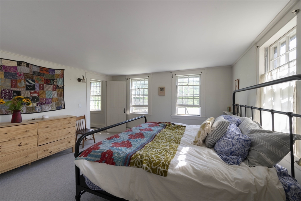 2 Chestnut Hill Road Leverett, MA 01054 - Photo 21 of 42 a bed room with a bed window and a dresser