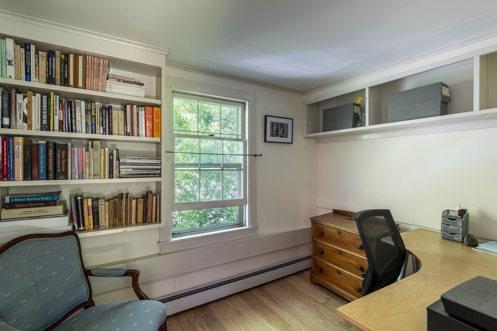 2 Chestnut Hill Road Leverett, MA 01054 - Photo 28 of 42 a living room with furniture and a book shelf