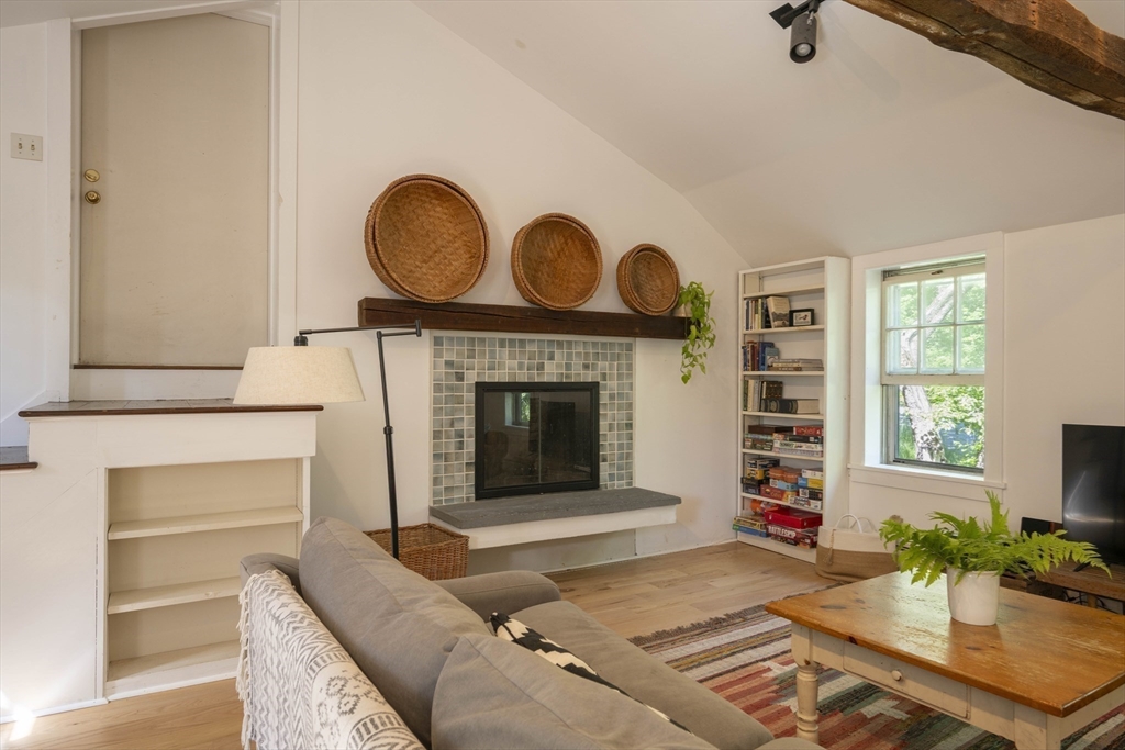 2 Chestnut Hill Road Leverett, MA 01054 - Photo 30 of 42 a living room with furniture and a fireplace