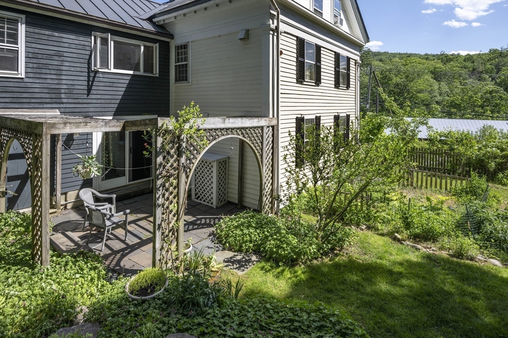 2 Chestnut Hill Road Leverett, MA 01054 - Photo 3 of 42 a view of a house with balcony and garden