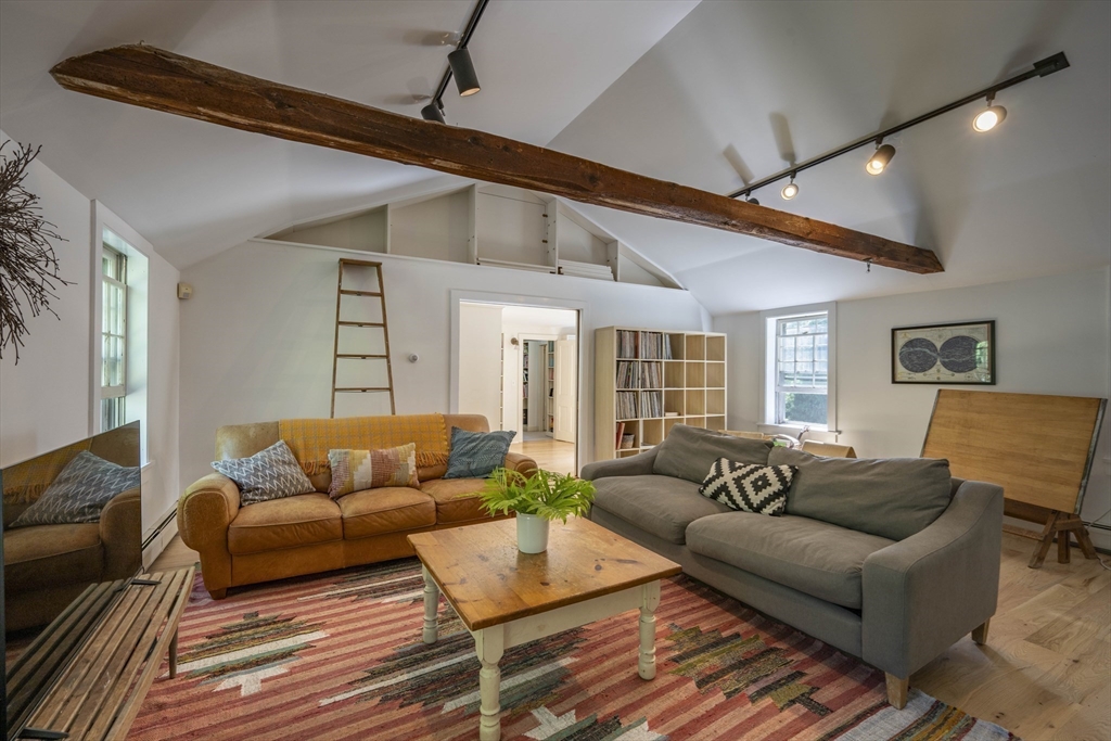 2 Chestnut Hill Road Leverett, MA 01054 - Photo 32 of 42 a living room with furniture and wooden floor