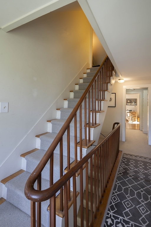 2 Chestnut Hill Road Leverett, MA 01054 - Photo 33 of 42 a view of staircase with lots of frames on wall and wooden floor