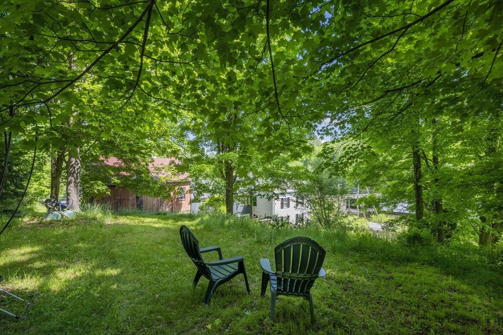 2 Chestnut Hill Road Leverett, MA 01054 - Photo 6 of 42 a view of a two chairs in a garden