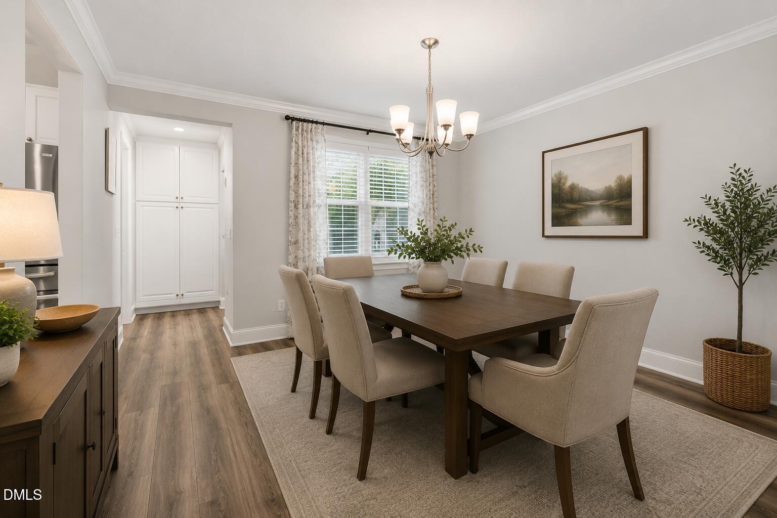 726 Thomas Road Rocky Mount, NC 27801 - Photo 9 of 55 a view of a dining room with furniture window and wooden floor