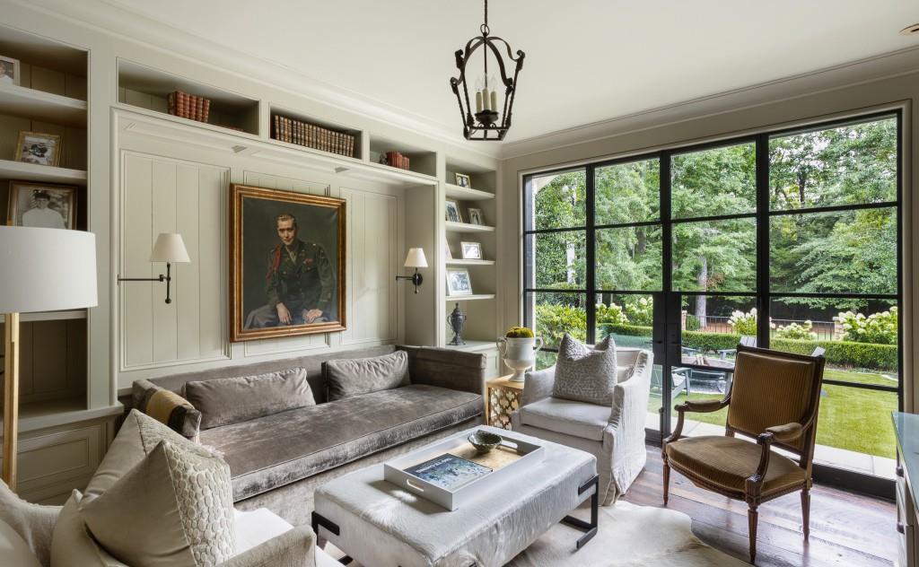 3741 Dumbarton Road Northwest Atlanta, GA 30327 - Photo 14 of 41 a living room with furniture and a chandelier