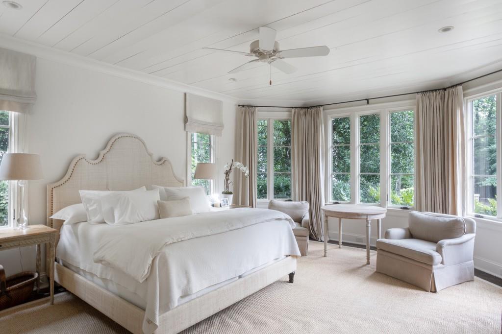 3741 Dumbarton Road Northwest Atlanta, GA 30327 - Photo 15 of 41 a bedroom with bed and a large window