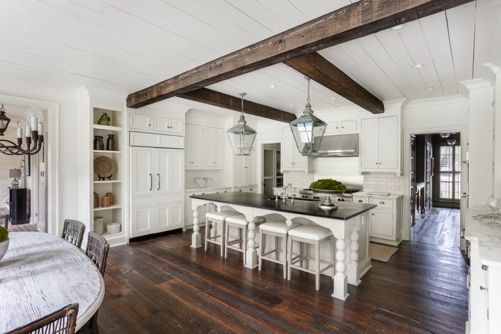 3741 Dumbarton Road Northwest Atlanta, GA 30327 - Photo 18 of 41 a kitchen with stove and wooden floor