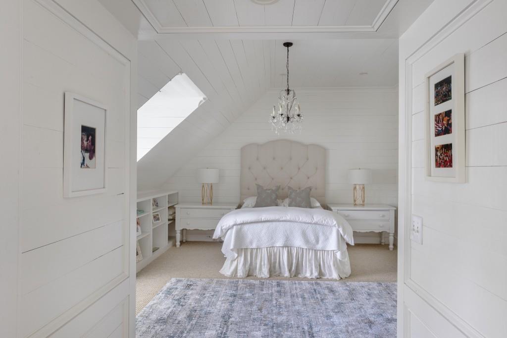 3741 Dumbarton Road Northwest Atlanta, GA 30327 - Photo 27 of 41 a bed room with a bed and a table