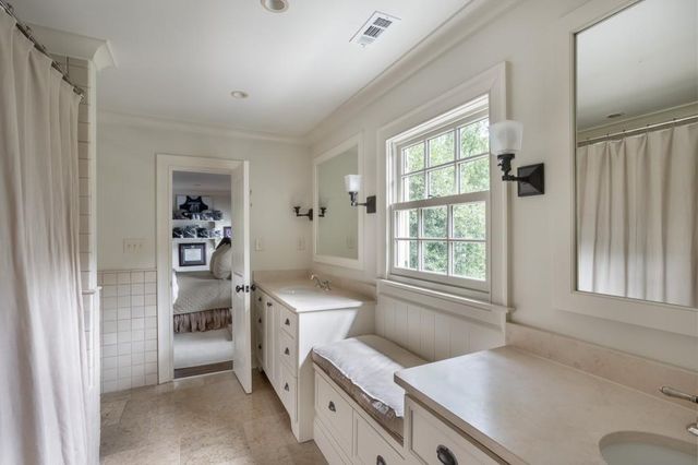a kitchen with a window and a sink