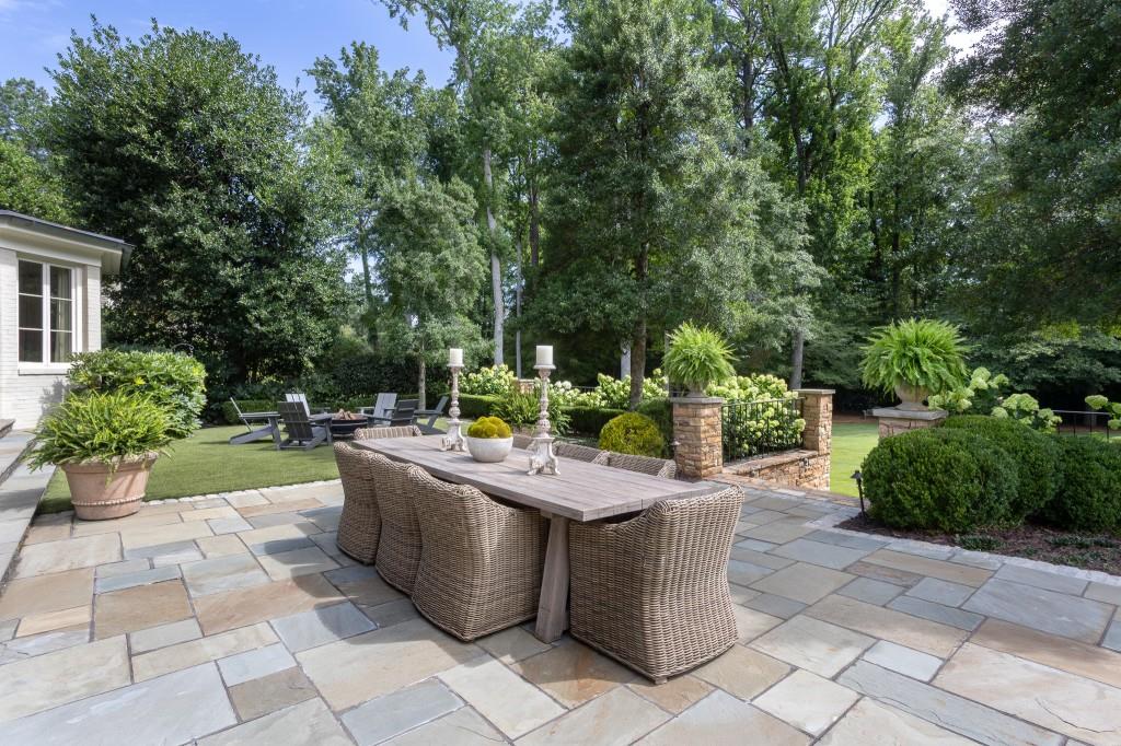 3741 Dumbarton Road Northwest Atlanta, GA 30327 - Photo 32 of 41 a view of a sitting area with trees in a backyard