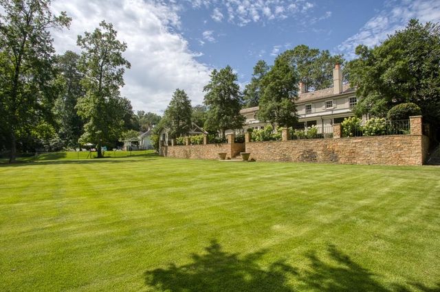 a view of a playground with basketball court