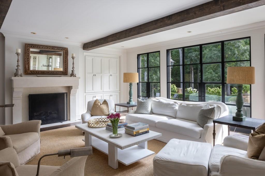 3741 Dumbarton Road Northwest Atlanta, GA 30327 - Photo 7 of 41 a living room with furniture large window and fireplace