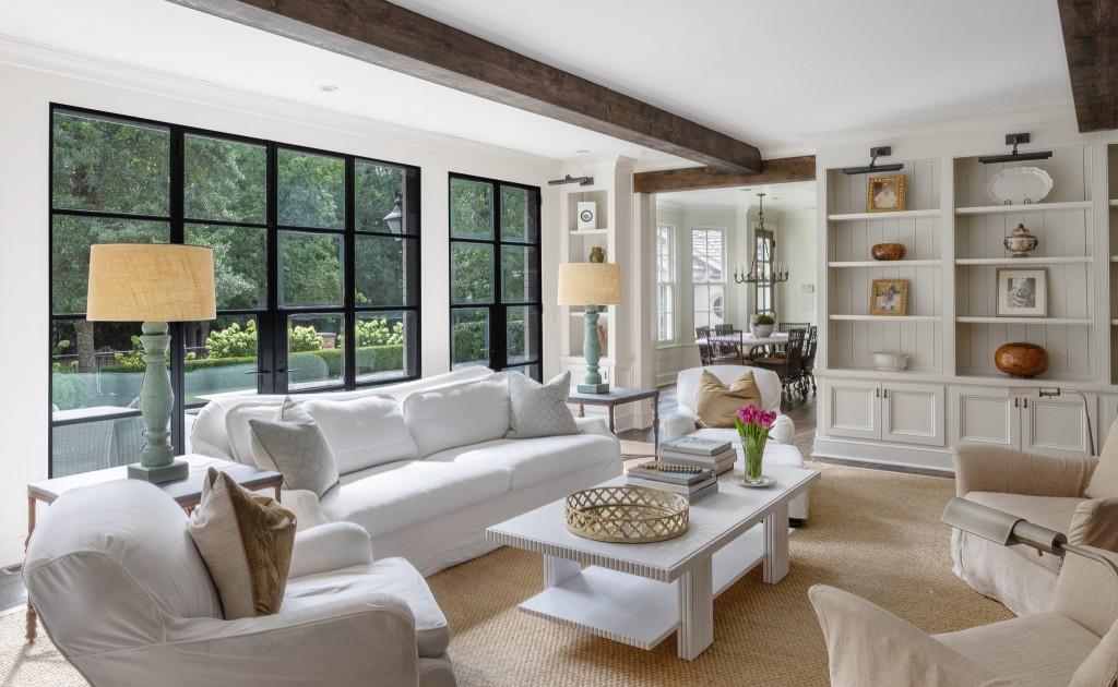 3741 Dumbarton Road Northwest Atlanta, GA 30327 - Photo 8 of 41 a living room with furniture and a large window