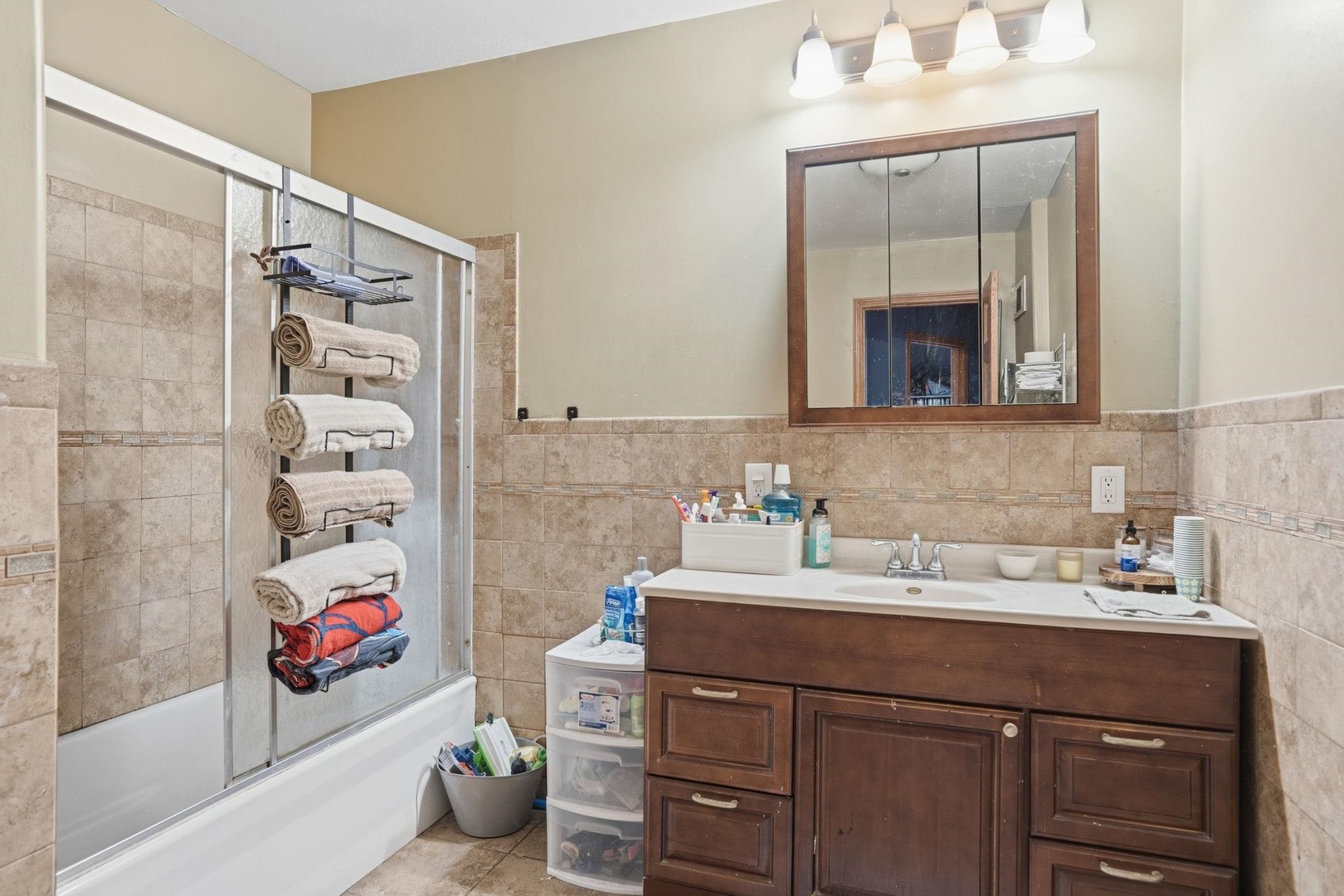 314 Washington Street Davenport, IA 52802 - Photo 11 of 22 a bathroom with a sink and a mirror