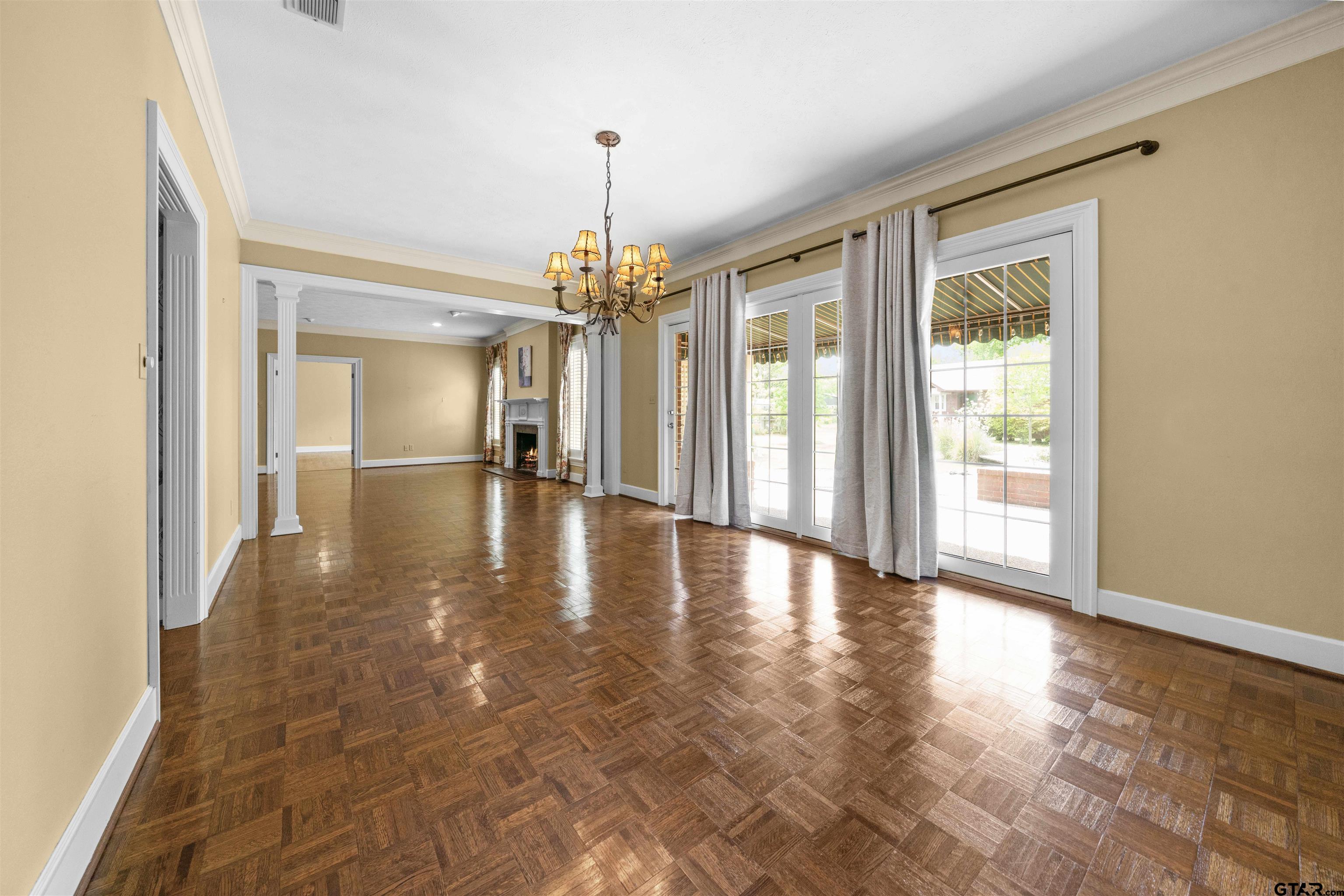 2103 Baylor Street Jacksonville, TX 75766 - Photo 18 of 45 a view of livingroom with hardwood floor and window