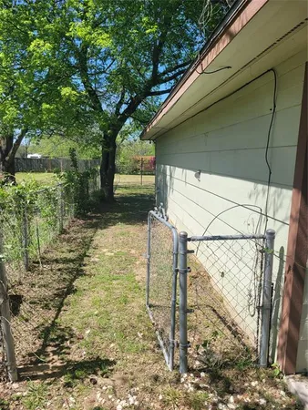 a backyard of a house with lots of green space