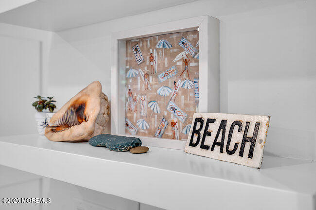 1204 5th Avenue Spring Lake, NJ 07762 - Photo 23 of 36 a white bath tub sitting next to a white wall